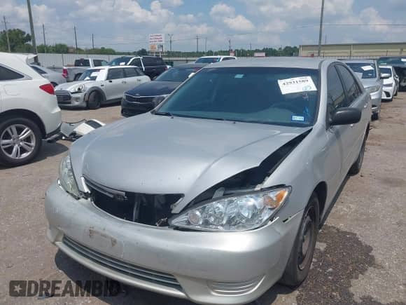 2005 Toyota Camry STD with VIN 4T1BE32K45U095345, listed as a IAAI auction lot 42931589 with 248,569 mi miles and . Bid and sale history available at DreamBid. Image 2.