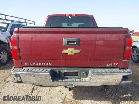 2014 Chevrolet Silverado 1500 LT with VIN 3GCUKREH4EG284122, listed as a IAAI auction lot 41667059 with 243,251 mi miles and . Bid and sale history available at DreamBid. Image 16.
