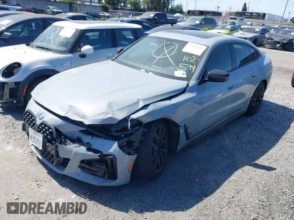 2023 BMW 4 Series 430i with VIN WBA63AV0XPFP44077, listed as a IAAI auction lot 41998141 with 17,946 mi miles and . Bid and sale history available at DreamBid. Image 2.