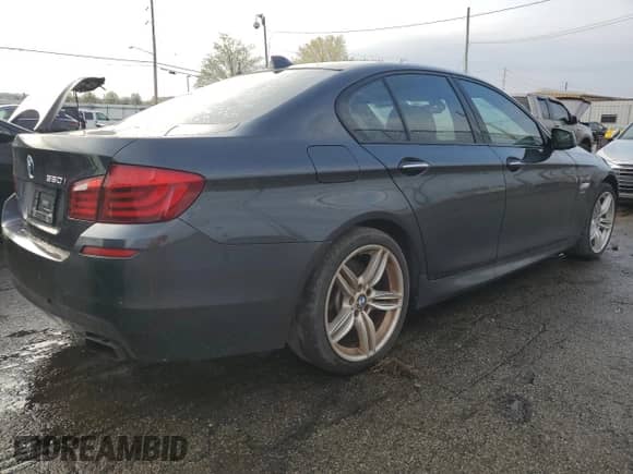 2012 BMW 5 Series 550i xDrive with VIN WBAFU9C56CC786915, listed as a Copart auction lot 52551245 with 77,187 mi miles and Clean title. Bid and sale history available at DreamBid. Image 3.