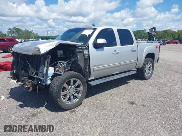 2010 GMC Sierra 1500 SLT with VIN 3GTRKWE30AG126587, listed as a IAAI auction lot 41773552 with 85,032 mi miles and . Bid and sale history available at DreamBid. Image 2.