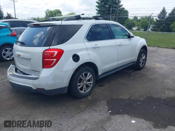 2016 Chevrolet Equinox LT z VIN 2GNALCEK1G1179694, wystawiony jako IAAI lot #42983144 z przebiegiem 137 009 mil mil oraz . Historia ofert i sprzedaży dostępna na DreamBid. Obrazek 4.