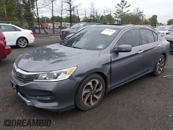 2016 Honda Accord EX-L with VIN 1HGCR3F83GA010013, listed as a IAAI auction lot 42878473 with 127,527 mi miles and . Bid and sale history available at DreamBid. Image 2.