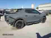 2024 Hyundai Santa Cruz Night Edition с VIN 5NTJCDDF7RH105623, выставлен на аукционе Copart как лот 75869034 с пробегом 2 397 миль миль и Списание • Salvage title. История ставок и продаж доступна на DreamBid. Изображение 3.