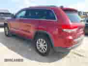 2014 Jeep Grand Cherokee Laredo with VIN 1C4RJEAGXEC473164, listed as a IAAI auction lot 42928191 with 143,889 mi miles and . Bid and sale history available at DreamBid. Image 3.