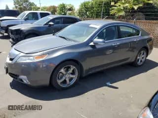 2009 Acura TL Technology с VIN 19UUA96579A005825, выставлен на аукционе Copart как лот 66380395 с пробегом 120 732 миль миль и Списание • Salvage title. История ставок и продаж доступна на DreamBid. Изображение 1.