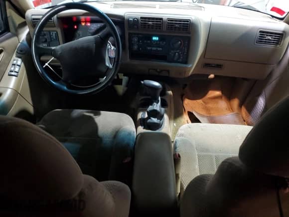 1997 Chevrolet Blazer LS with VIN 1GNDT13WXV2156113, listed as a Copart auction lot 57405055 with 203,821 mi miles and Clean title. Bid and sale history available at DreamBid. Image 8.