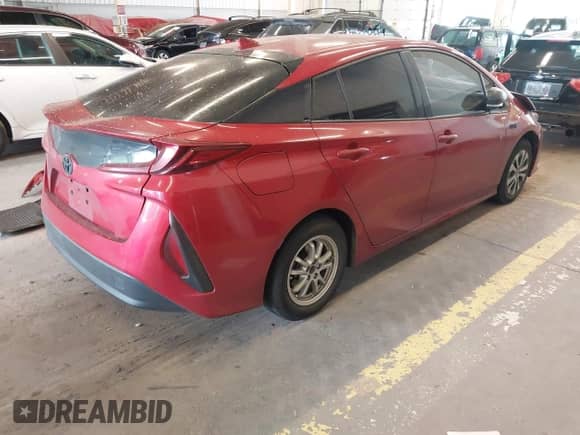 2018 Toyota Prius Plus z VIN JTDKARFP5J3077221, wystawiony jako IAAI lot #42544838 z przebiegiem 84 902 mil mil oraz . Historia ofert i sprzedaży dostępna na DreamBid. Obrazek 4.