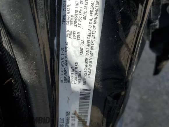 2023 Ram 1500 Laramie z VIN 1C6SRFJT5PN665765, wystawiony jako Copart lot #70183715 z przebiegiem Nie podano mil oraz Nie do naprawy • Non repairable. Historia ofert i sprzedaży dostępna na DreamBid. Obrazek 12.