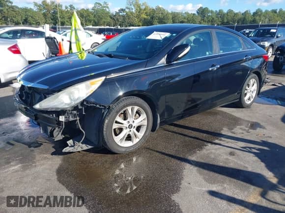 2013 Hyundai Sonata SE with VIN 5NPEC4AC0DH667107, listed as a IAAI auction lot 43428955 with 190,362 mi miles and . Bid and sale history available at DreamBid. Image 2.