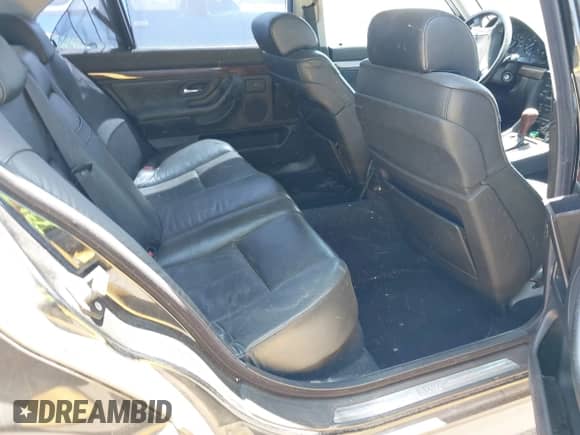 1998 BMW 7 Series 740iL with VIN WBAGJ832XWDM16899, listed as a IAAI auction lot 42361106 with 177,379 mi miles and . Bid and sale history available at DreamBid. Image 8.