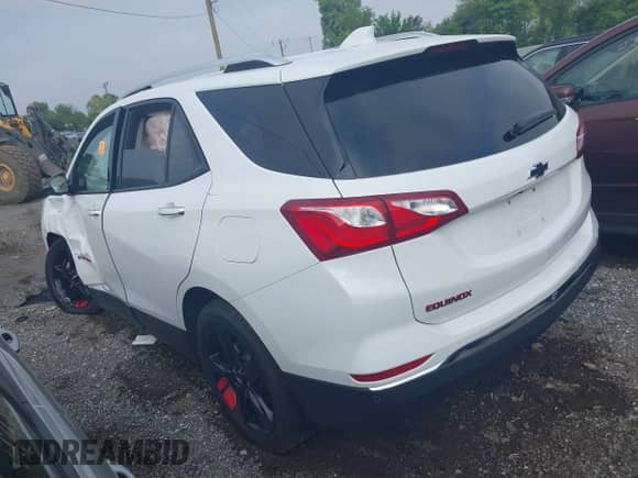 2021 Chevrolet Equinox Premier with VIN 2GNAXNEV7M6151875, listed as a IAAI auction lot 42580389 with Not provided miles and . Bid and sale history available at DreamBid. Image 3.
