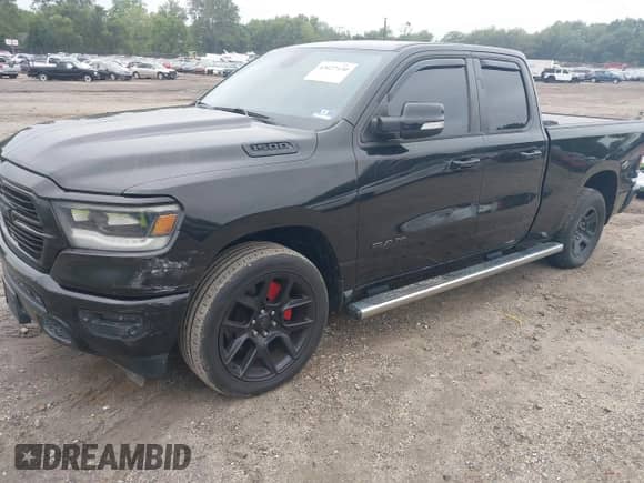 2019 Ram 1500 Big Horn z VIN 1C6SRFBT9KN645994, wystawiony jako IAAI lot #43027130 z przebiegiem 110 119 mil mil oraz . Historia ofert i sprzedaży dostępna na DreamBid. Obrazek 18.