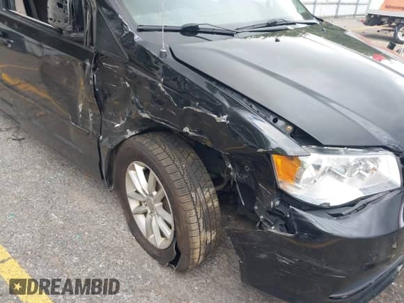 2014 Dodge Grand Caravan SXT with VIN 2C4RDGCG7ER291753, listed as a IAAI auction lot 43149467 with 111,617 mi miles and . Bid and sale history available at DreamBid. Image 6.
