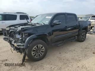 2021 Toyota Tacoma SR5 with VIN 3TYAZ5CN3MT002850, listed as a Copart auction lot 87184125 with 87,522 mi miles and Salvage title. Bid and sale history available at DreamBid. Image 1.