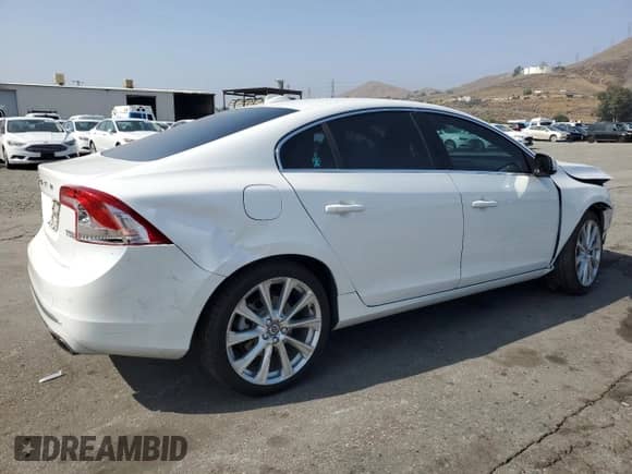 2018 Volvo S60 Inscription Platinum с VIN LYV402HMXJB162601, выставлен на аукционе Copart как лот 60302225 с пробегом 80 940 миль миль и Списание • Salvage title. История ставок и продаж доступна на DreamBid. Изображение 3.