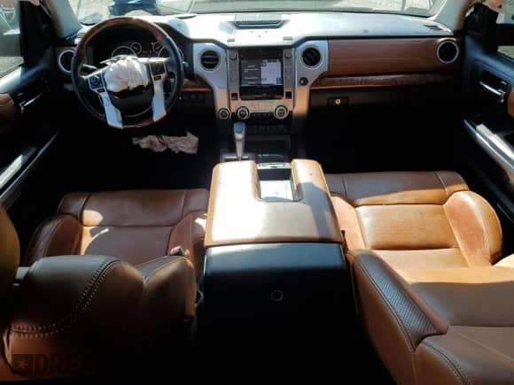 2015 Toyota Tundra 1794 Edition with VIN 5TFAW5F14FX485999, listed as a Copart auction lot 82696155 with 92,982 mi miles and Salvage title. Bid and sale history available at DreamBid. Image 8.