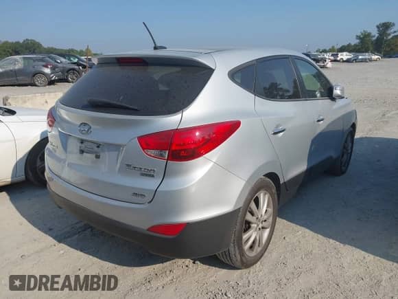 2013 Hyundai Tucson GLS with VIN KM8JUCAC4DU729468, listed as a IAAI auction lot 43157791 with 155,911 mi miles and . Bid and sale history available at DreamBid. Image 4.