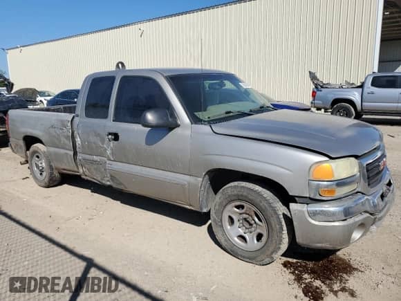 2003 GMC Sierra 1500 with VIN 2GTEC19VX31251523, listed as a Copart auction lot 70610284 with 314,771 mi miles and Salvage title. Bid and sale history available at DreamBid. Image 4.