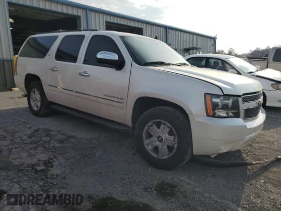 2014 Chevrolet Suburban LTZ z VIN 1GNSKKE79ER161364, wystawiony jako Copart lot #81703945 z przebiegiem 133 606 mil mil oraz Szkoda całkowita • Salvage title. Historia ofert i sprzedaży dostępna na DreamBid. Obrazek 4.