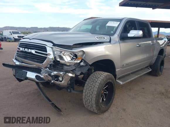 2019 Ram 1500 Big Horn with VIN 1C6RREFT4KN828335, listed as a IAAI auction lot 42170532 with 76,593 mi miles and . Bid and sale history available at DreamBid. Image 2.