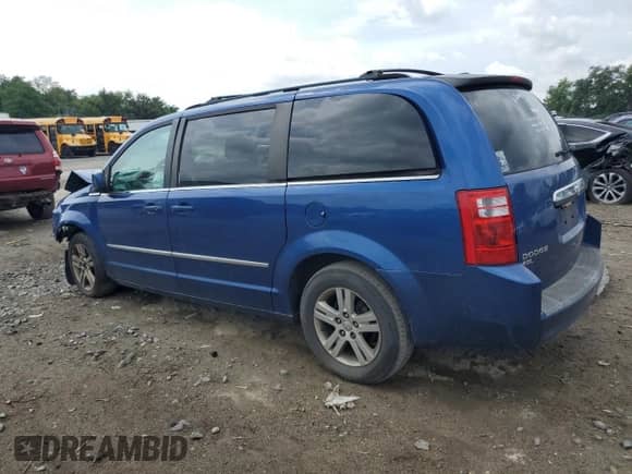 2010 Dodge Grand Caravan SXT with VIN 2D4RN5DXXAR411879, listed as a Copart auction lot 68370535 with 190,664 mi miles and Salvage title. Bid and sale history available at DreamBid. Image 2.