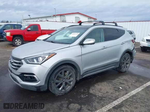 2018 Hyundai Santa Fe Ultimate with VIN 5XYZWDLA7JG542869, listed as a IAAI auction lot 41889520 with 51,294 mi miles and . Bid and sale history available at DreamBid. Image 2.