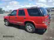 2000 Chevrolet Blazer LT with VIN 1GNDT13W8Y2392666, listed as a Copart auction lot 56652895 with 223,924 mi miles and Salvage title. Bid and sale history available at DreamBid. Image 2.