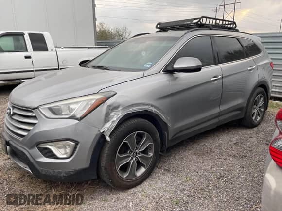 2015 Hyundai Santa Fe GLS with VIN KM8SM4HF4FU088867, listed as a IAAI auction lot 41725425 with 283,301 mi miles and . Bid and sale history available at DreamBid. Image 2.