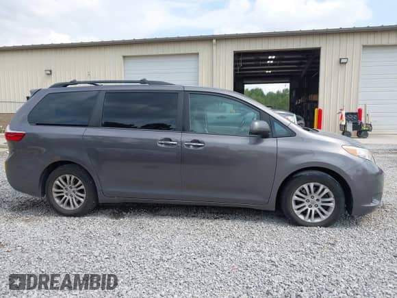 2015 Toyota Sienna XLE with VIN 5TDYK3DCXFS666338, listed as a IAAI auction lot 43282074 with 174,049 mi miles and . Bid and sale history available at DreamBid. Image 13.