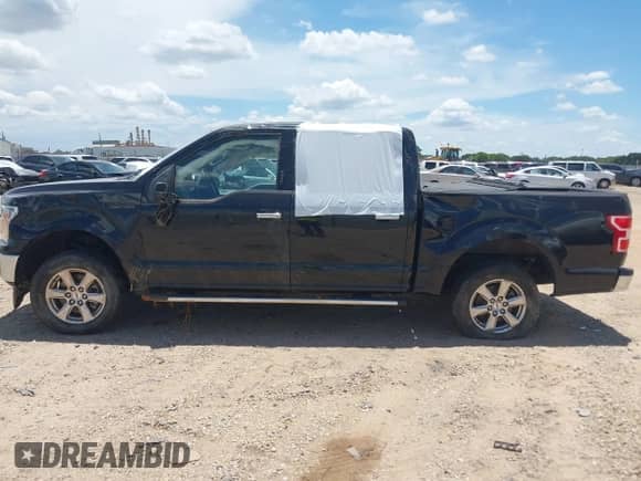 2019 Ford F-150 XL with VIN 1FTEW1CPXKFC01505, listed as a IAAI auction lot 42664322 with 114,179 mi miles and . Bid and sale history available at DreamBid. Image 14.