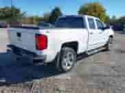 2014 Chevrolet Silverado 1500 LTZ with VIN 1GCVKSEC6EZ253146, listed as a IAAI auction lot 43368232 with 136,880 mi miles and . Bid and sale history available at DreamBid. Image 4.