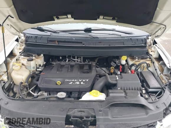 2013 Dodge Journey American Value z VIN 3C4PDCAB2DT576623, wystawiony jako IAAI lot #43018876 z przebiegiem 119 698 mil mil oraz . Historia ofert i sprzedaży dostępna na DreamBid. Obrazek 10.