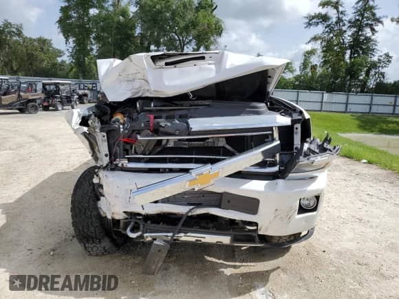 2019 Chevrolet Silverado 2500HD High Country с VIN 1GC1KUEYXKF274908, выставлен на аукционе Copart как лот 59925885 с пробегом 199 093 миль миль и На запчасти • Non repairable. История ставок и продаж доступна на DreamBid. Изображение 5.