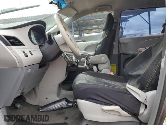 2014 Toyota Sienna L with VIN 5TDZK3DC5ES474294, listed as a Copart auction lot 55762625 with 88,969 mi miles and Salvage title. Bid and sale history available at DreamBid. Image 7.