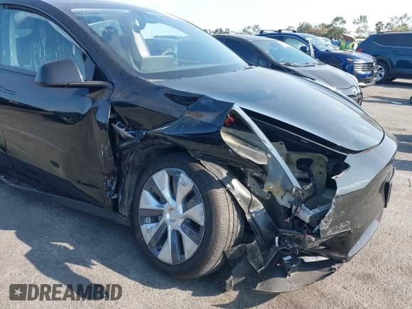 2023 Tesla Model Y Long Range z VIN 7SAYGAEE9PF851348, wystawiony jako IAAI lot #43167064 z przebiegiem Nie podano mil oraz . Historia ofert i sprzedaży dostępna na DreamBid. Obrazek 6.