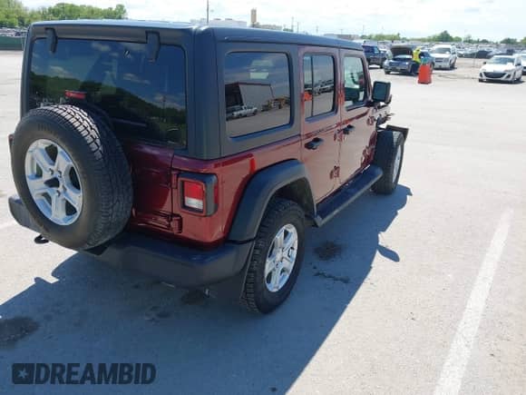2021 Jeep Wrangler Unlimited Sport with VIN 1C4HJXKNXMW709412, listed as a IAAI auction lot 42151533 with 77,547 mi miles and . Bid and sale history available at DreamBid. Image 4.