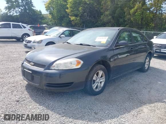2014 Chevrolet Impala LS with VIN 2G1WA5E33E1113629, listed as a IAAI auction lot 43428520 with 174,467 mi miles and . Bid and sale history available at DreamBid. Image 2.