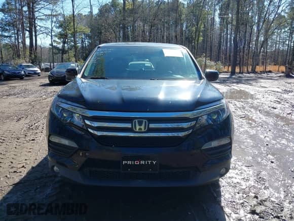 2016 Honda Pilot EX with VIN 5FNYF5H47GB024457, listed as a IAAI auction lot 41509558 with 115,439 mi miles and . Bid and sale history available at DreamBid. Image 13.
