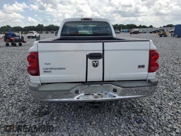 2005 Dodge Dakota SLT с VIN 1D7HE42N95S308273, выставлен на аукционе Copart как лот 66825675 с пробегом 104 340 миль миль и Чистый • Clean title. История ставок и продаж доступна на DreamBid. Изображение 6.