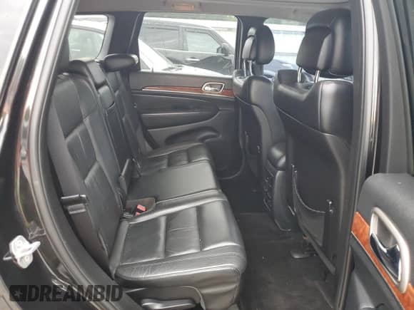2013 Jeep Grand Cherokee Limited с VIN 1C4RJEBG9DC642510, выставлен на аукционе Copart как лот 70267665 с пробегом 145 799 миль миль и Списание • Salvage title. История ставок и продаж доступна на DreamBid. Изображение 11.