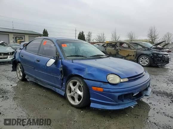 1995 Dodge Neon Highline z VIN 3B3ES47C8ST569791, wystawiony jako Copart lot #45310685 z przebiegiem 213 330 mil mil oraz Szkoda całkowita • Salvage title. Historia ofert i sprzedaży dostępna na DreamBid. Obrazek 11.