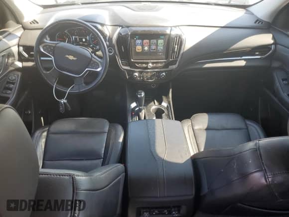 2018 Chevrolet Traverse Premier с VIN 1GNEVJKW7JJ259277, выставлен на аукционе Copart как лот 61576945 с пробегом 93 824 миль миль и Списание • Salvage title. История ставок и продаж доступна на DreamBid. Изображение 8.