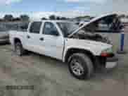 2002 Dodge Dakota Sport z VIN 1B7HL38X92S587514, wystawiony jako Copart lot #81796315 z przebiegiem Nie podano mil oraz Szkoda całkowita • Salvage title. Historia ofert i sprzedaży dostępna na DreamBid. Obrazek 4.