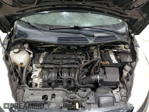 2013 Ford Fiesta S с VIN 3FADP4AJ5DM107100, выставлен на аукционе Copart как лот 85511955 с пробегом 194 329 миль миль и На запчасти • Non repairable. История ставок и продаж доступна на DreamBid. Изображение 11.