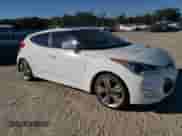 2013 Hyundai Veloster w/Gray Int z VIN KMHTC6AD3DU171621, wystawiony jako Copart lot #80663404 z przebiegiem Nie podano mil oraz Czysty tytuł • Clean title. Historia ofert i sprzedaży dostępna na DreamBid. Obrazek 4.