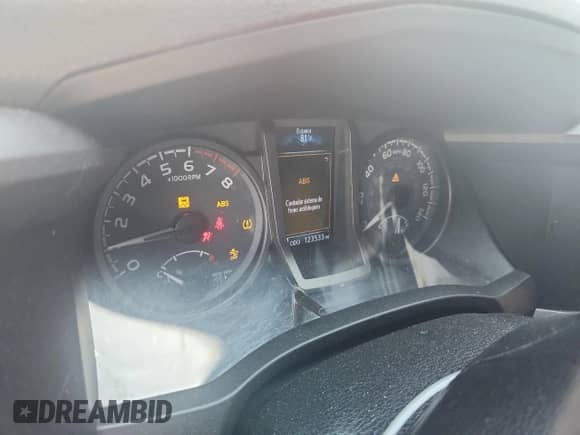 2020 Toyota Tacoma SR5 z VIN 3TMCZ5AN3LM365185, wystawiony jako Copart lot #65887715 z przebiegiem 123 533 mil mil oraz Szkoda całkowita • Salvage title. Historia ofert i sprzedaży dostępna na DreamBid. Obrazek 9.