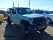 2024 Jeep Wrangler Willys with VIN 1C4RJXDNXRW135984, listed as a IAAI auction lot 40789537 with 6,609 mi miles and . Bid and sale history available at DreamBid. Image 1.