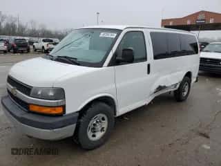 2013 Chevrolet Express Passenger 1LT с VIN 1GAZGYFG4D1190237, выставлен на аукционе Copart как лот 49204764 с пробегом 159 160 миль миль и Списание • Salvage title. История ставок и продаж доступна на DreamBid. Изображение 1.