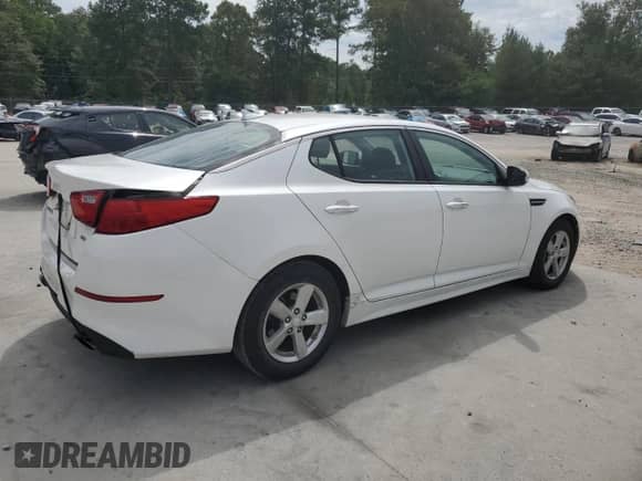 2015 Kia Optima LX with VIN KNAGM4A79F5630761, listed as a Copart auction lot 70302334 with 106,427 mi miles and Salvage title. Bid and sale history available at DreamBid. Image 3.